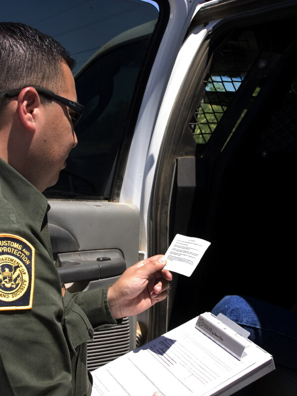CBP_Border_Patrol_agent_reads_the_Miranda_rights.jpg