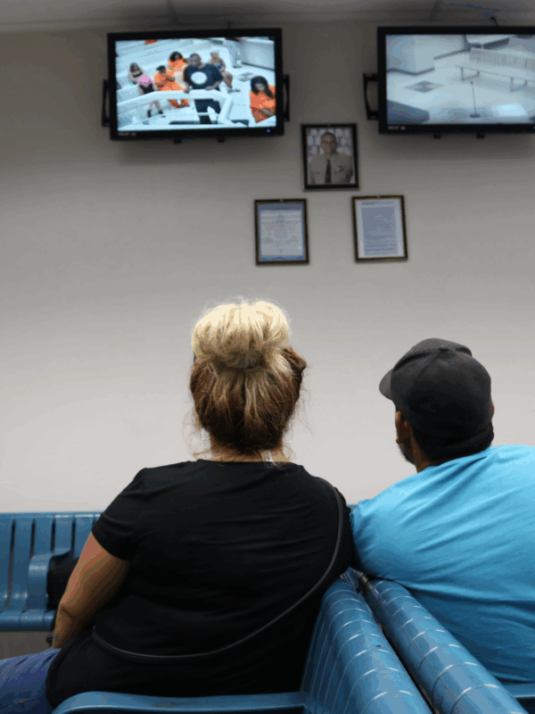 Families watch bail hearings at Fourth Avenue Jail