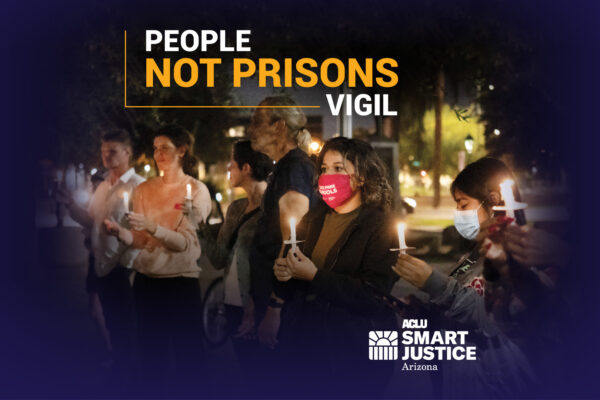 People holding vigil candles at the Arizona State Capitol