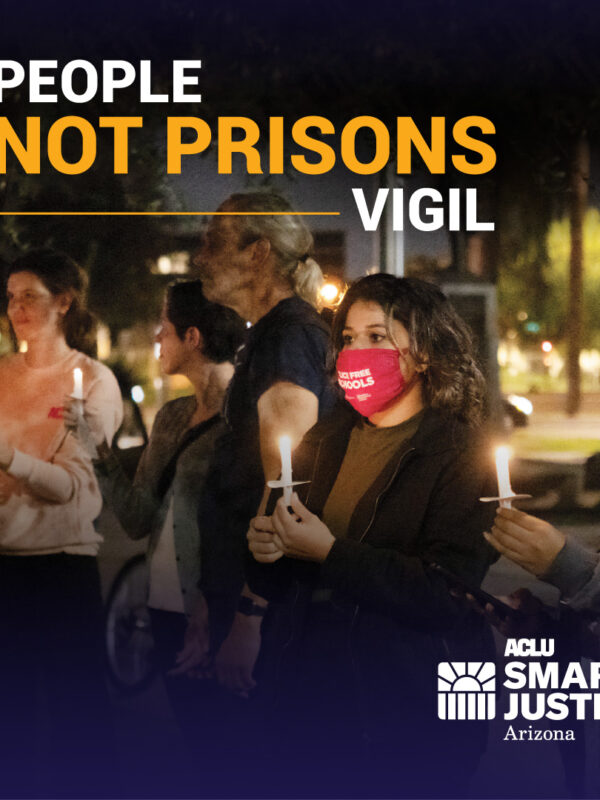 People holding vigil candles at the Arizona State Capitol