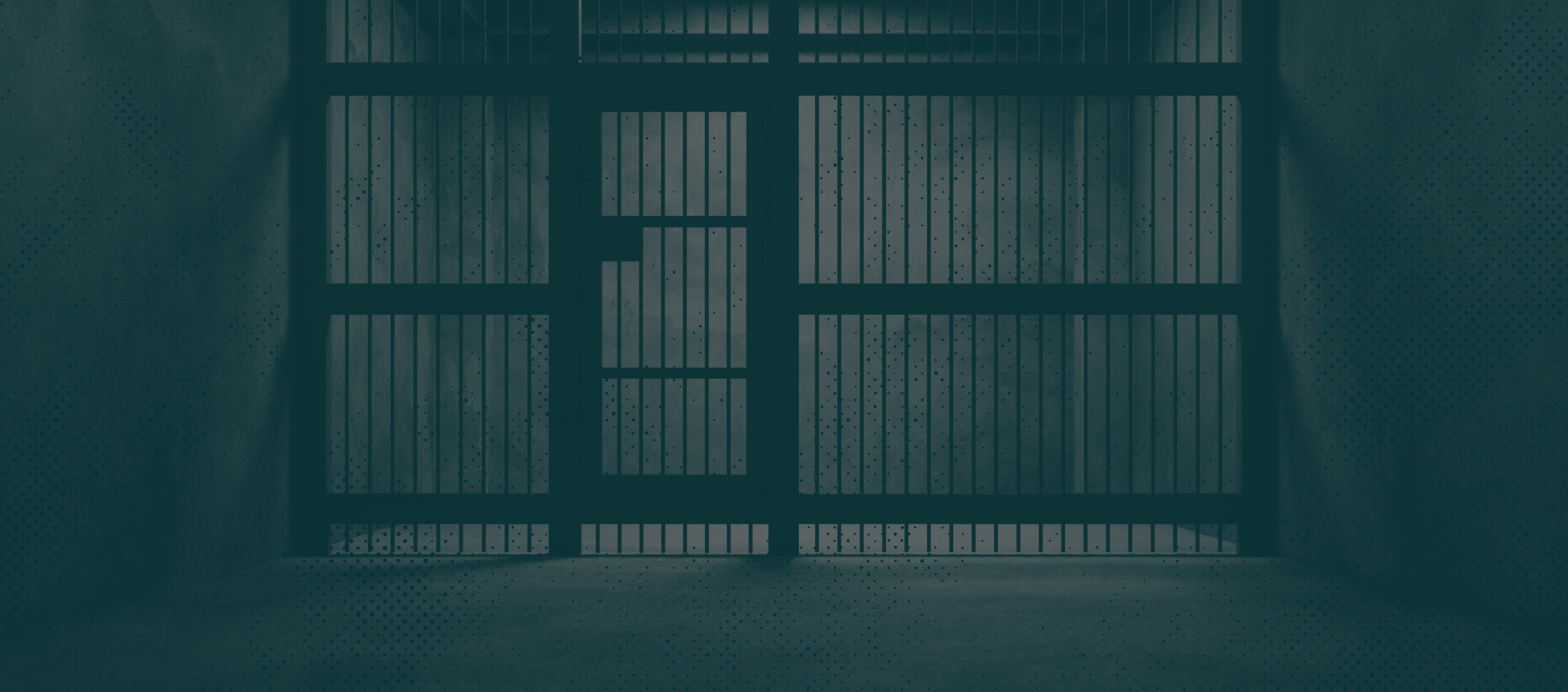 Image of jail cell with a green monochromatic overlay.