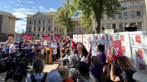 Advocates come together for a press conference and rally for Prop 139.