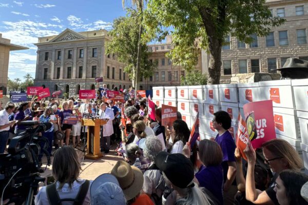 Advocates come together for a press conference and rally for Prop 139.