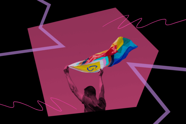 Waving a pride flag.