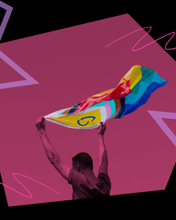 Waving a pride flag.