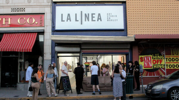 People gather at La Linea Art Studio in Nogales, Arizona.