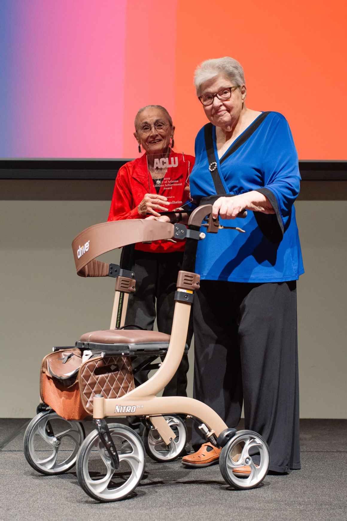 Rivko Knox presents Alice Bendheim with the Civil Libertarian of the Year Award in 2019.