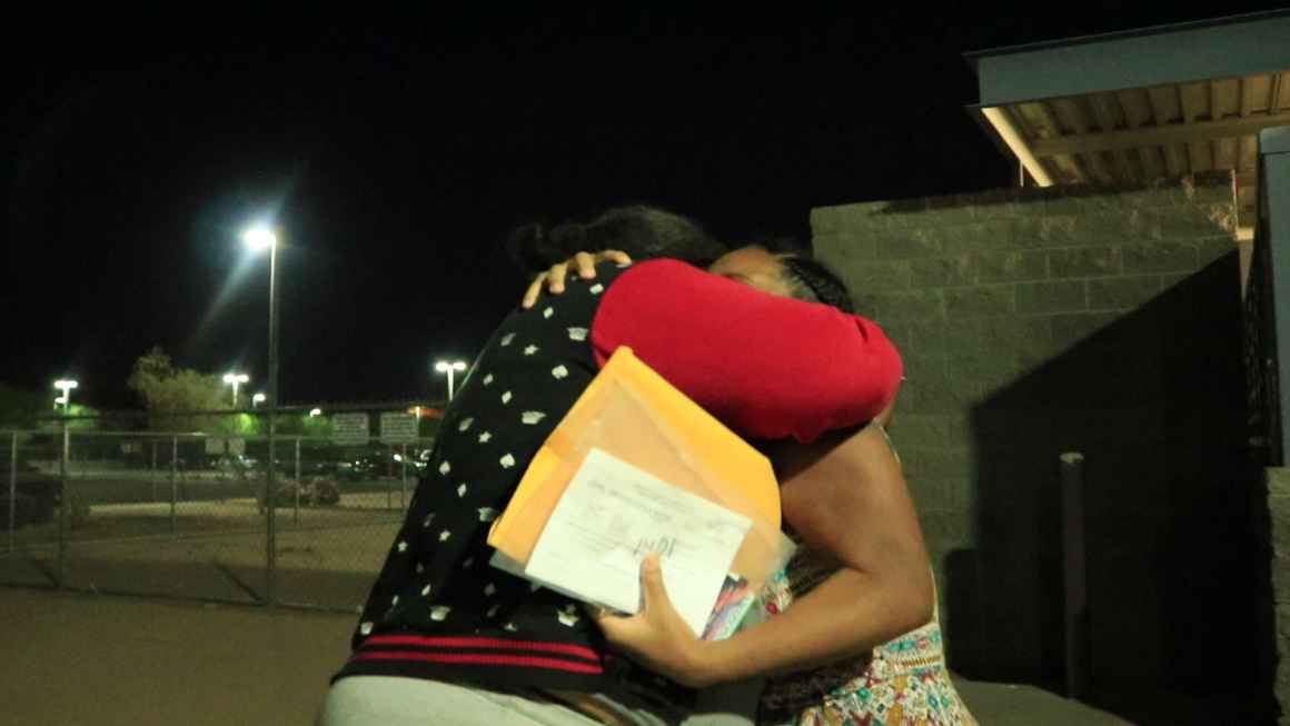 Theresa hugs her best friend moments after being released from jail. 