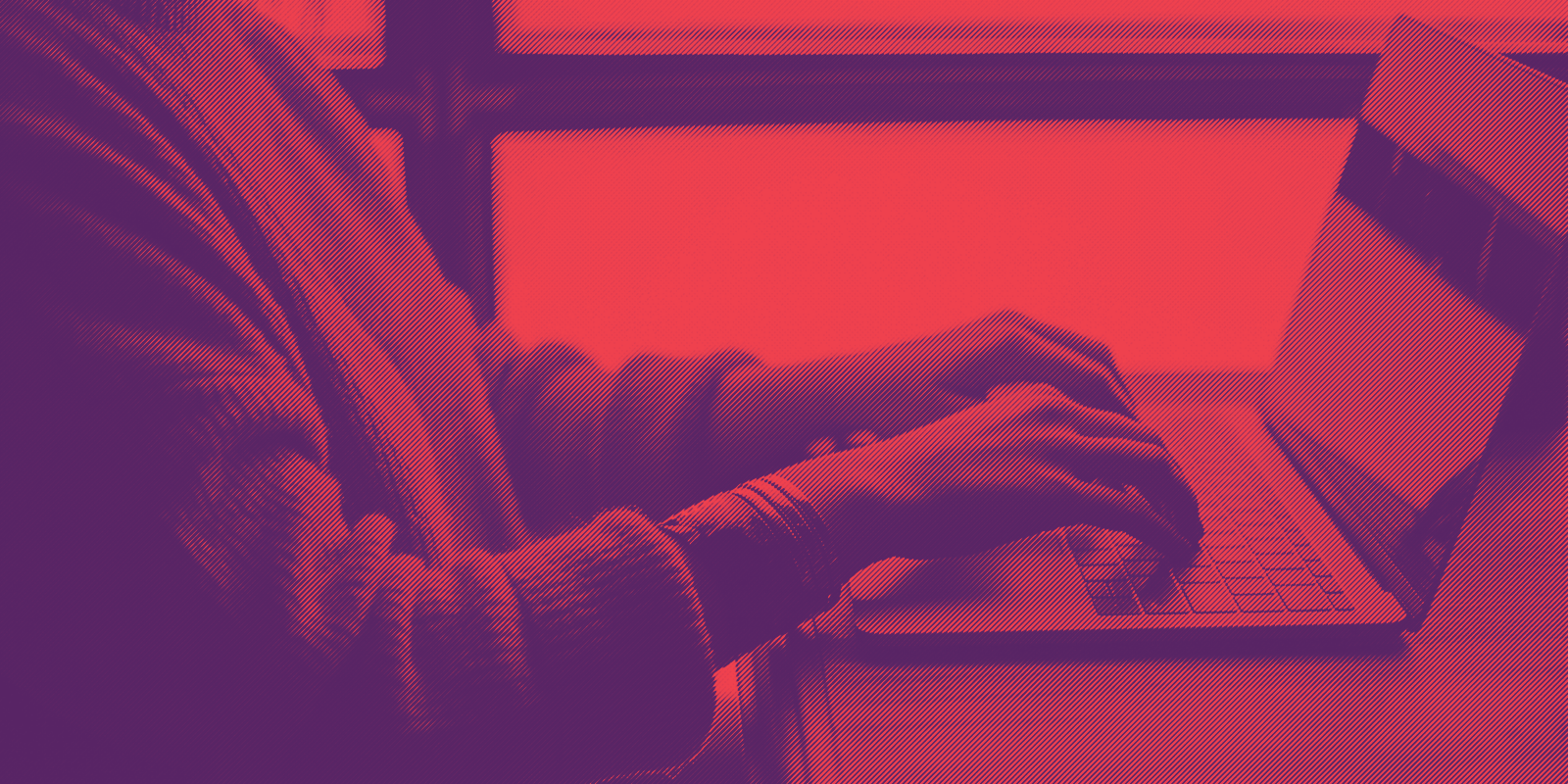 Person typing on laptop