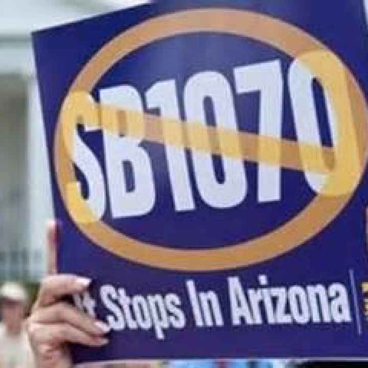 sb 1070 poster sign